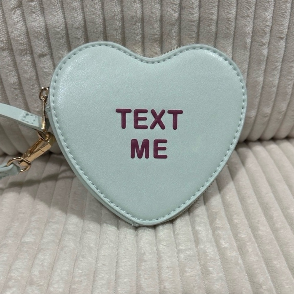 Heart-Shaped Wristlet Bag in Light Mint with 'TEXT ME' Detail. New. Not used.